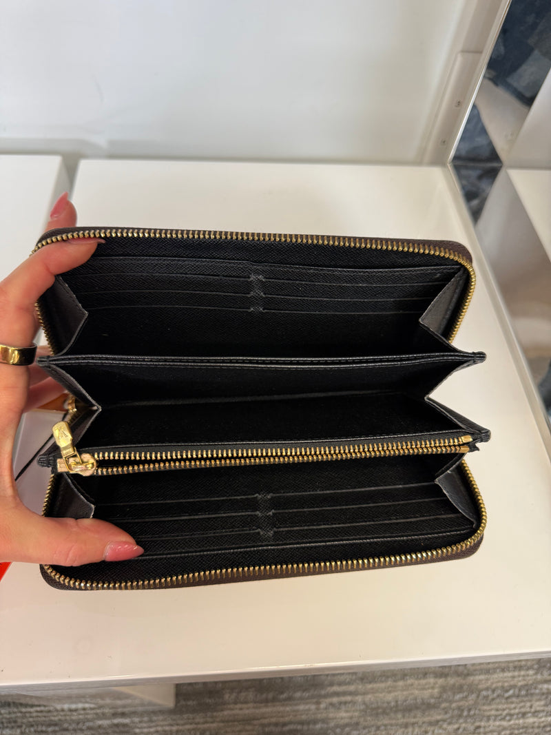 Louis Vuitton Reverse Monogram Zip Wallet