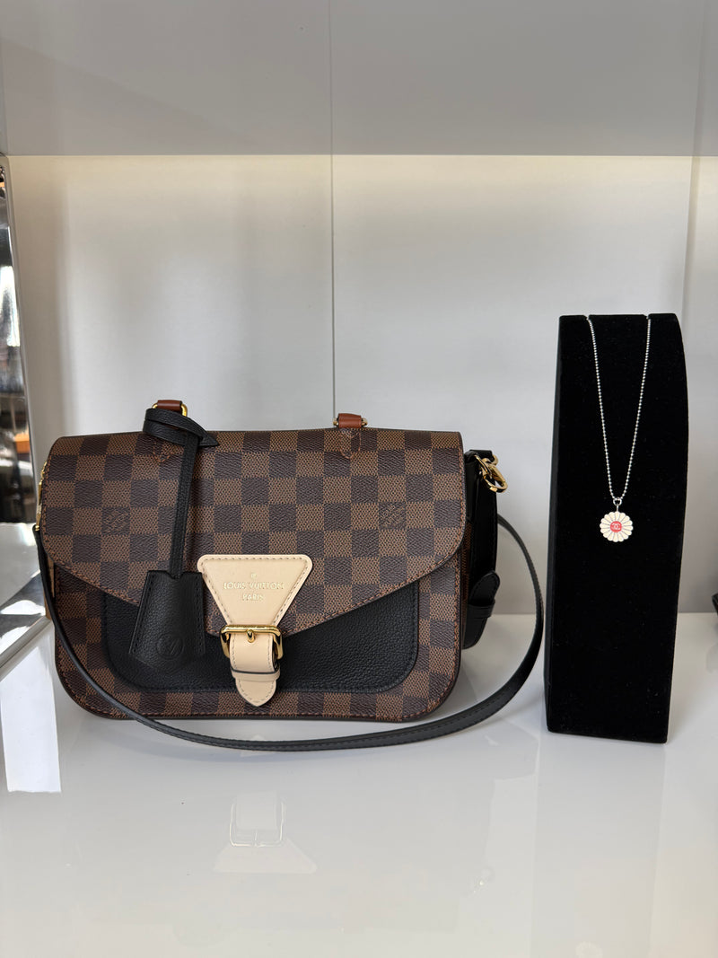Upgrade to Chanel necklace and LV Damier bag