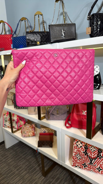 Chanel pink clutch