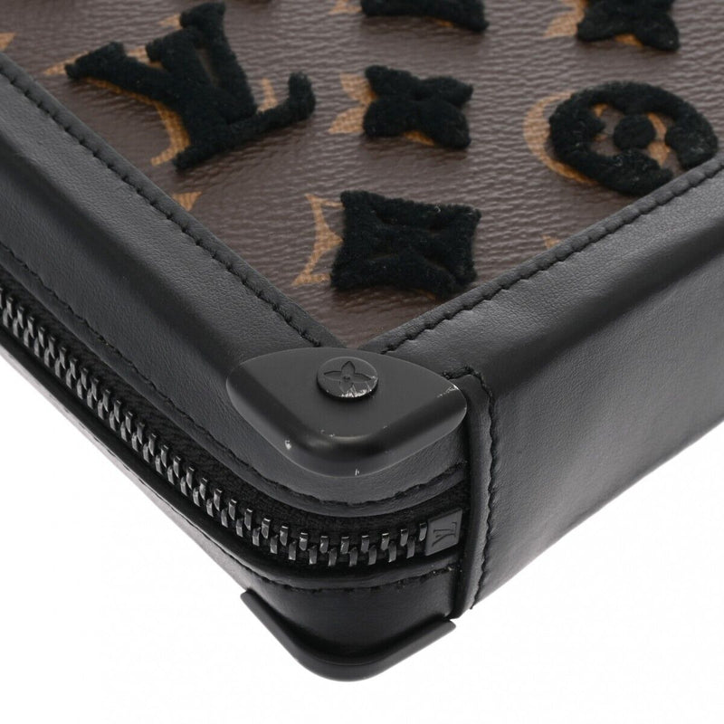 Louis Vuitton Tuftage Soft Trunk Clutch