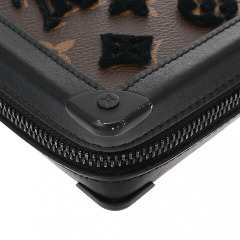 Louis Vuitton Tuftage Soft Trunk Clutch