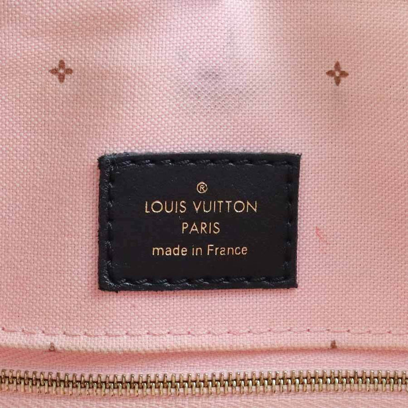 Louis Vuitton On The Go Mm Handbag