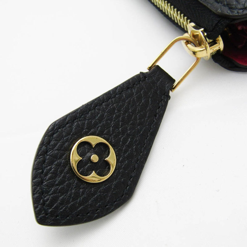 Louis Vuitton Taurillon Comete Wallet