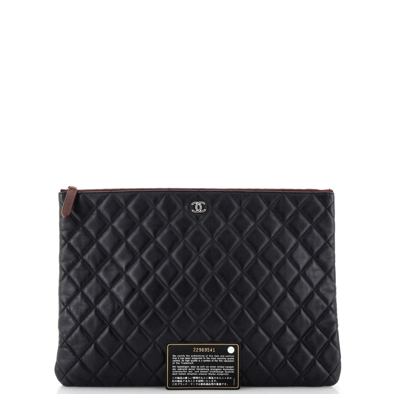 Chanel O Case Clutch Quilted Lambskin