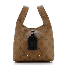 Louis Vuitton Atlantis Handbag Reverse