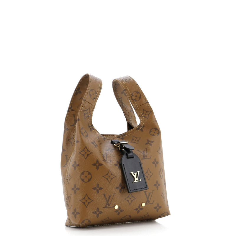 Louis Vuitton Atlantis Handbag Reverse