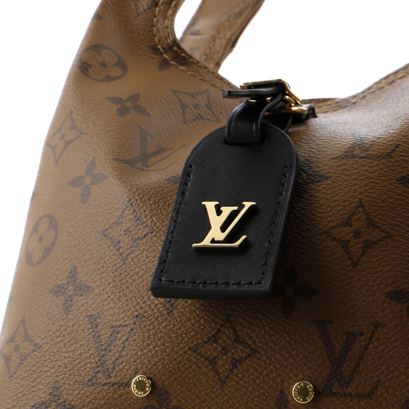 Louis Vuitton Atlantis Handbag Reverse