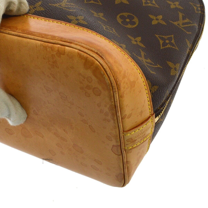 Louis Vuitton Alma Handbag