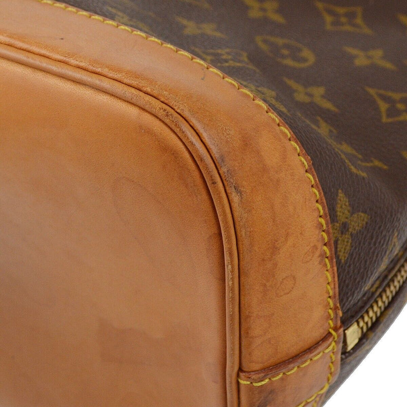 Louis Vuitton Alma Handbag