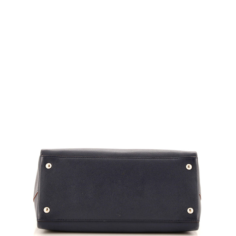 Louis Vuitton Lockmeto Handbag Leather