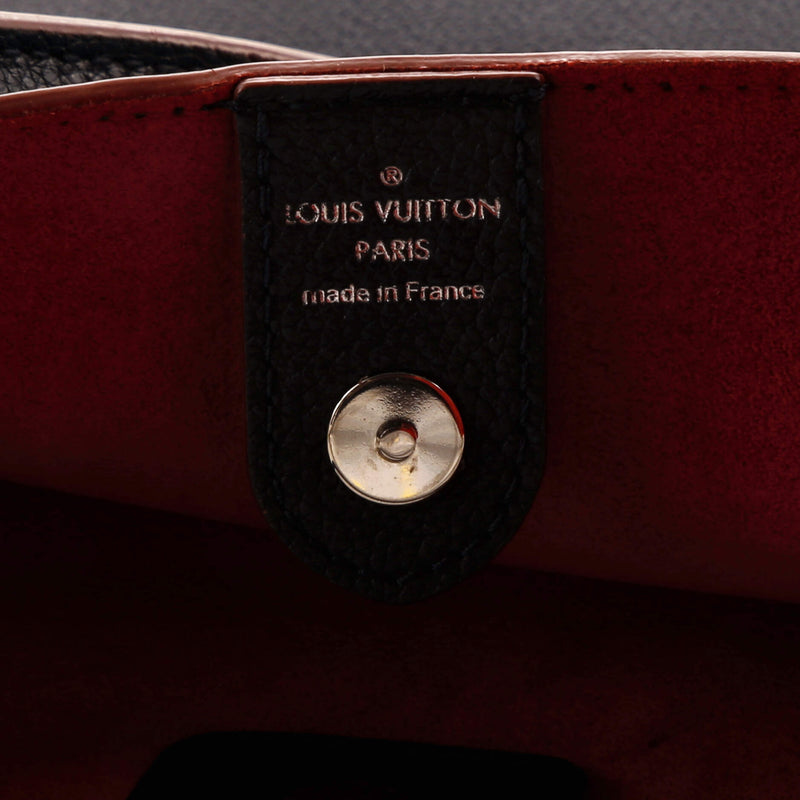 Louis Vuitton Lockmeto Handbag Leather