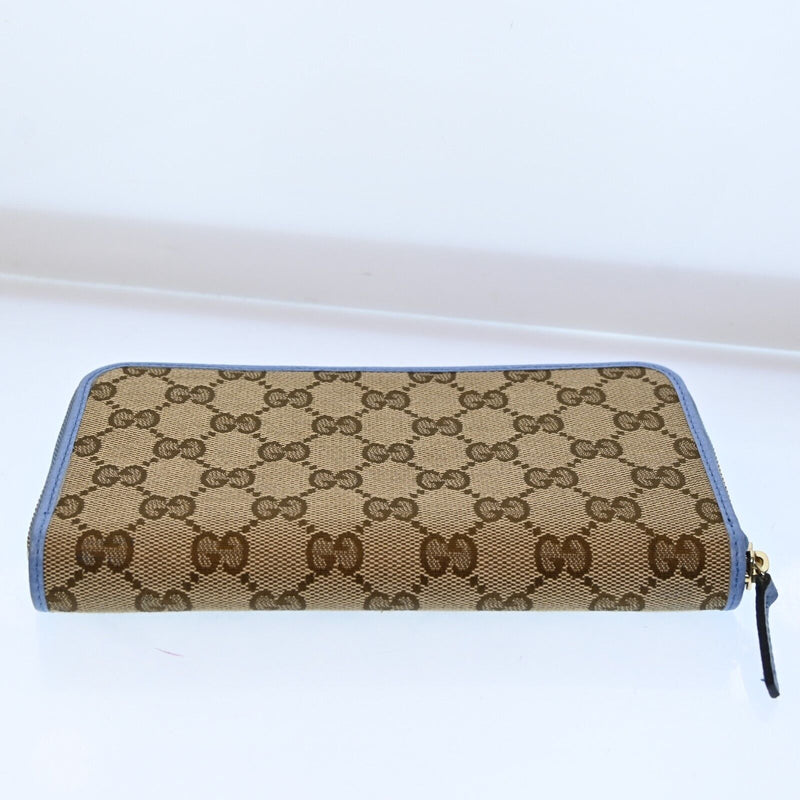 Gucci Gg Canvas Leather Zippy Long