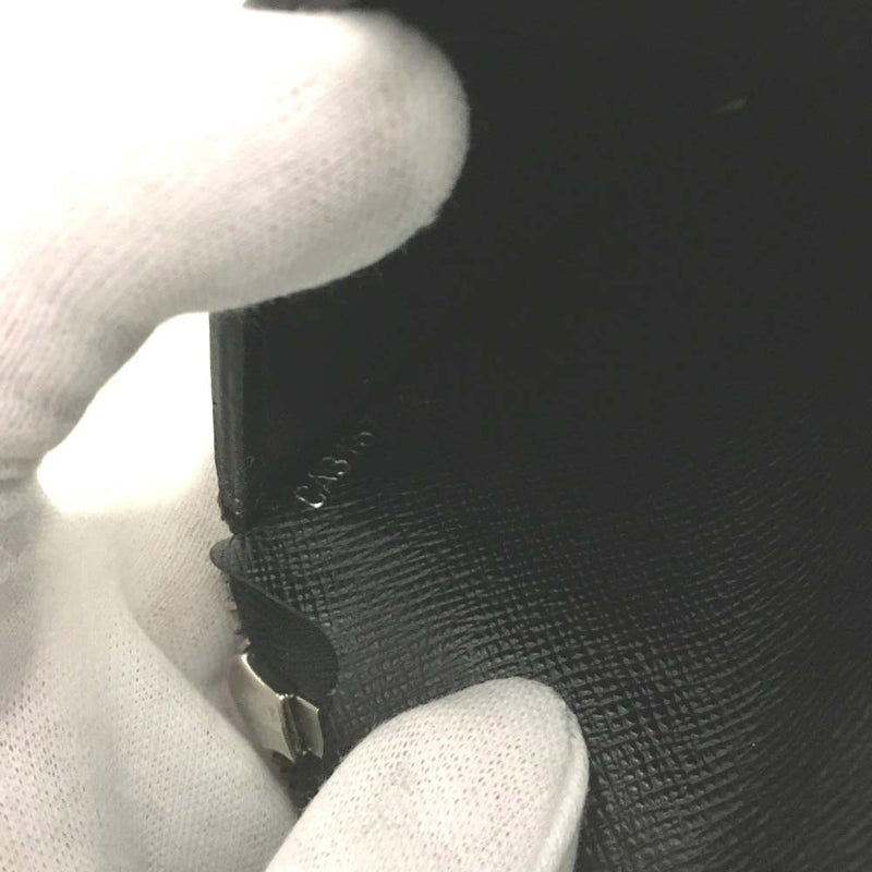 Louis Vuitton Macassar Vertical Zippy