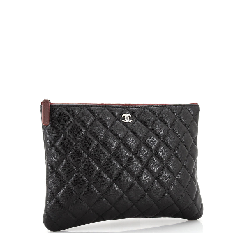 Chanel O Case Clutch Quilted Caviar