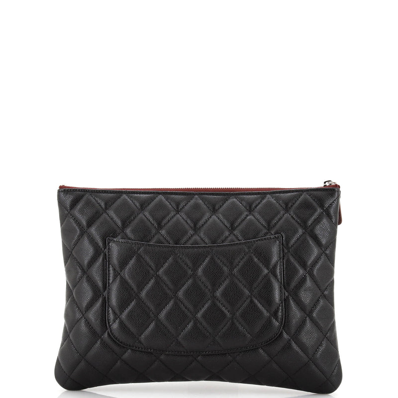 Chanel O Case Clutch Quilted Caviar