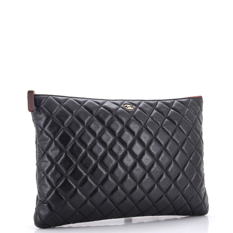 Chanel O Case Clutch Quilted Caviar