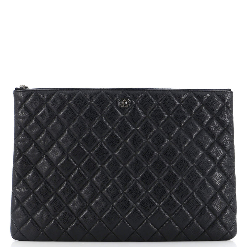 Chanel O Case Clutch Quilted Caviar