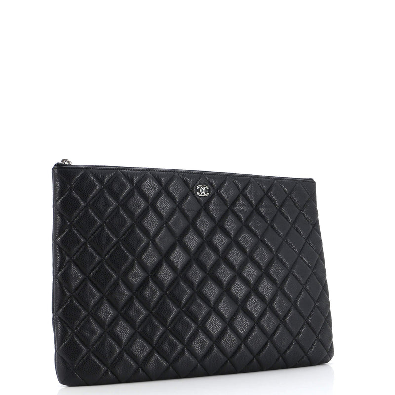 Chanel O Case Clutch Quilted Caviar