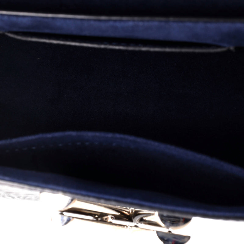 Louis Vuitton Braided Handle Twist Bag
