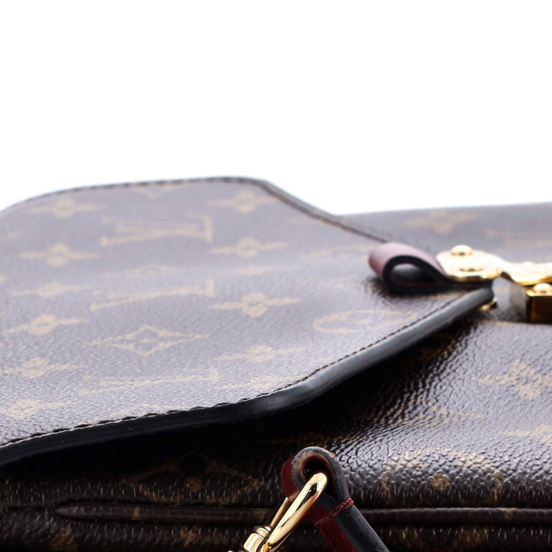 Louis Vuitton Braided Handle Pochette