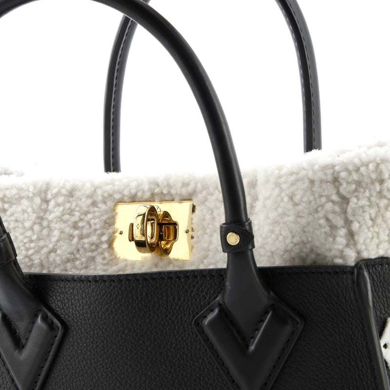 Louis Vuitton On My Side Tote Leather