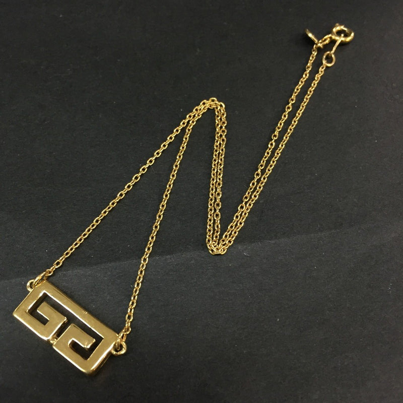 Givenchy Gg Logo Gold Tone Pendant