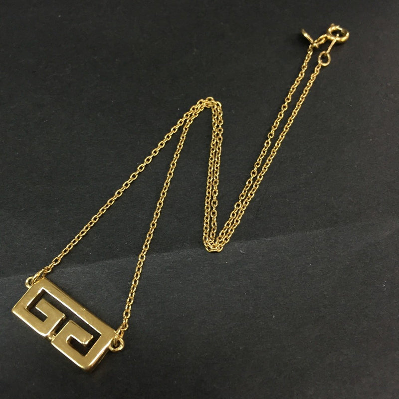 Givenchy Gg Logo Gold Tone Pendant