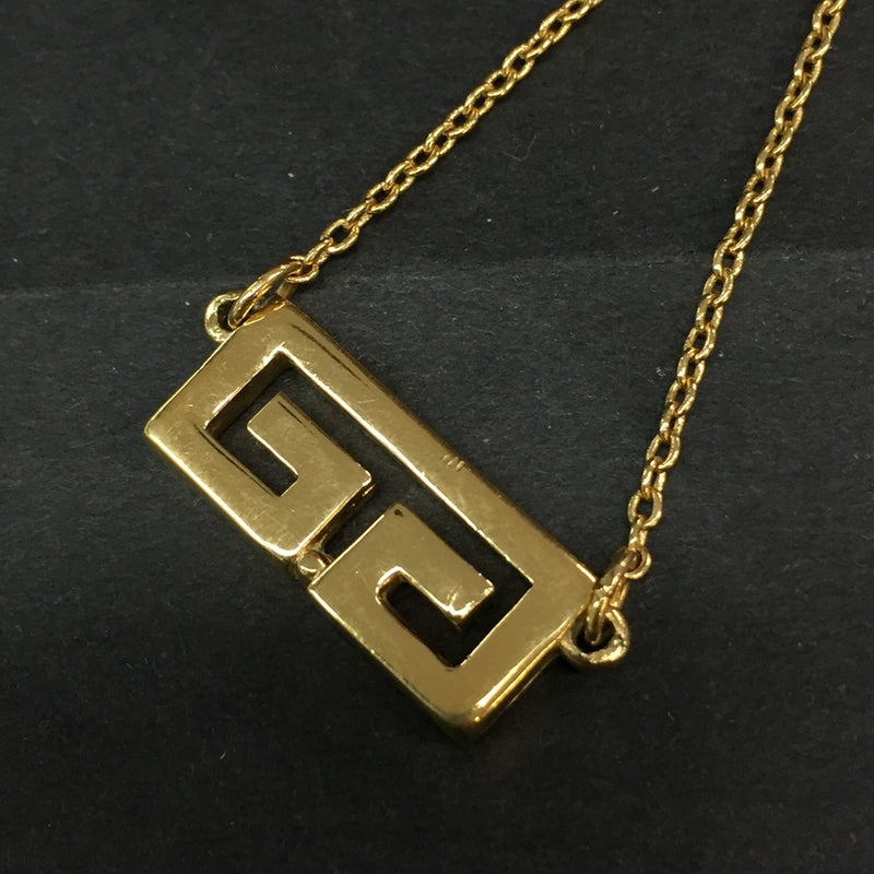 Givenchy Gg Logo Gold Tone Pendant
