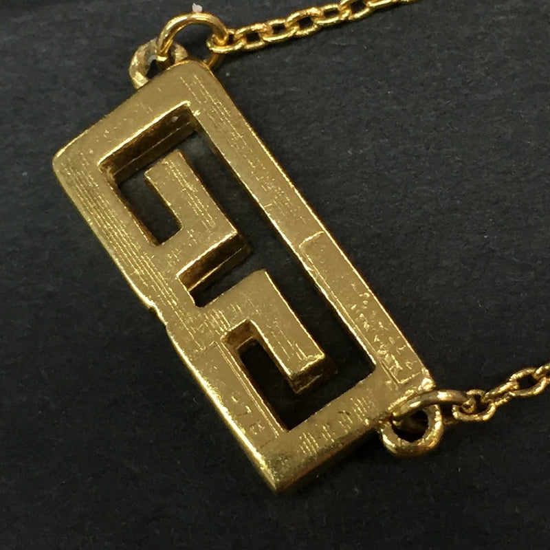 Givenchy Gg Logo Gold Tone Pendant