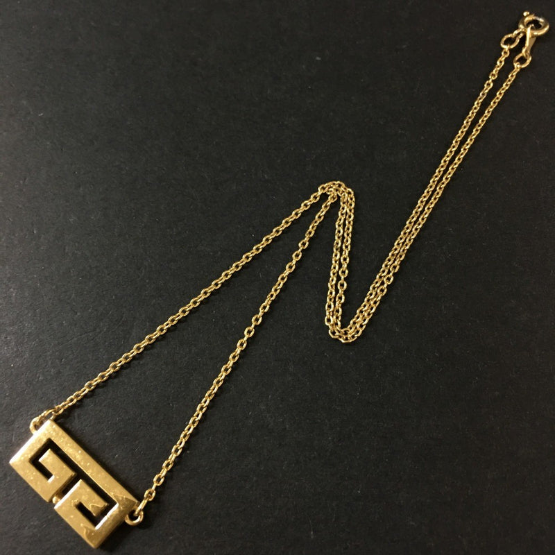 Givenchy Gg Logo Gold Tone Pendant
