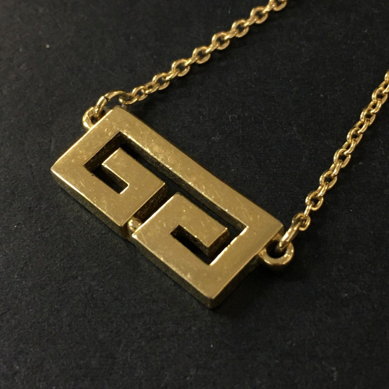 Givenchy Gg Logo Gold Tone Pendant
