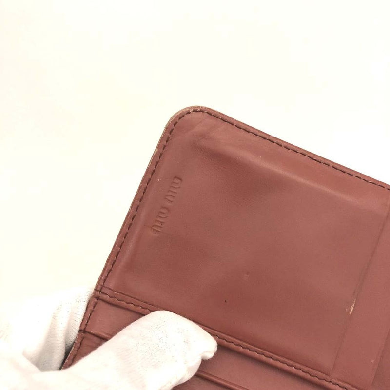 Miu Logo Embossed Leather Bifold Wallet