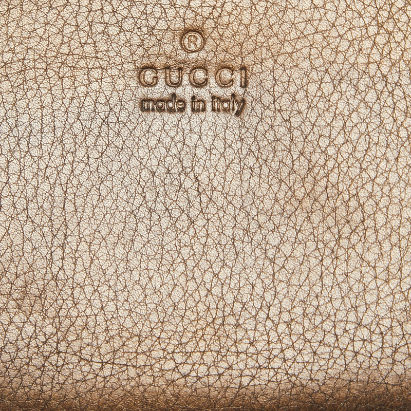 Gucci Metallic Leather Bamboo Tassel Zip