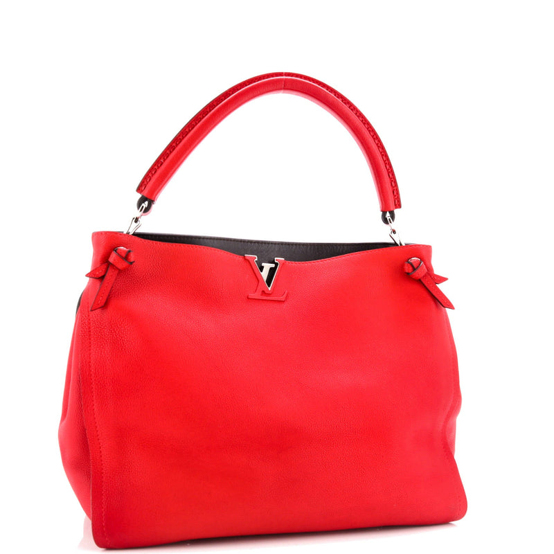 Louis Vuitton Tournon Handbag Leather