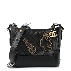 Chanel Aged Calfskin Quilted Charms
