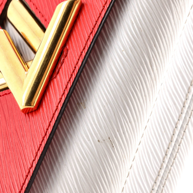 Louis Vuitton Twist And Twisty Handbag