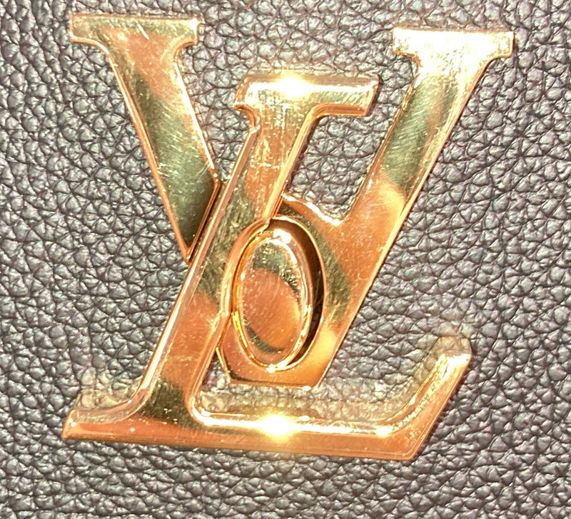 Louis Vuitton Lock And Walk Bucket Bag
