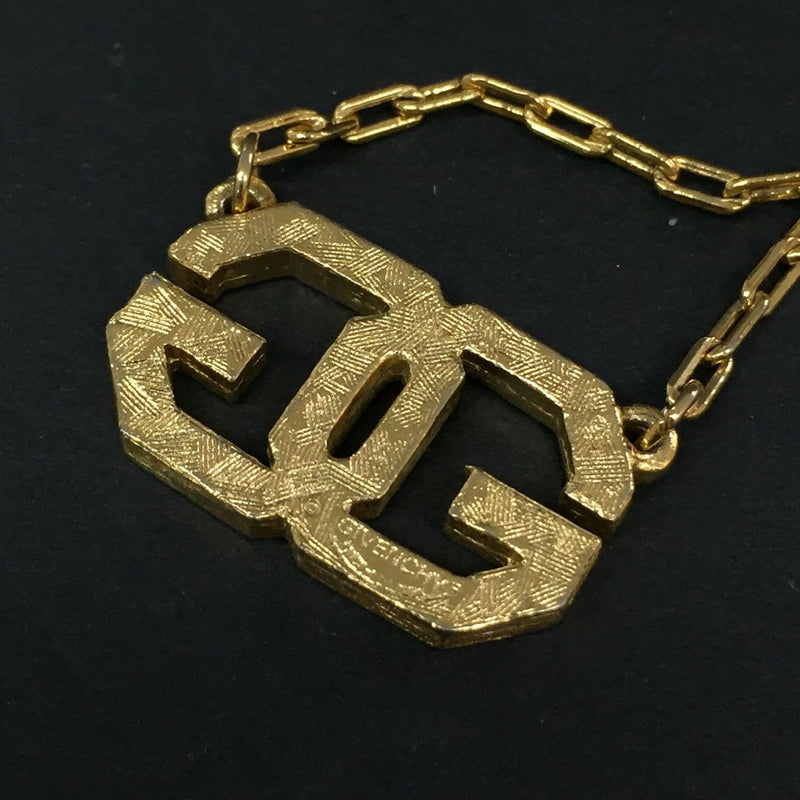 Givenchy Gg Logo Gold Tone Pendant