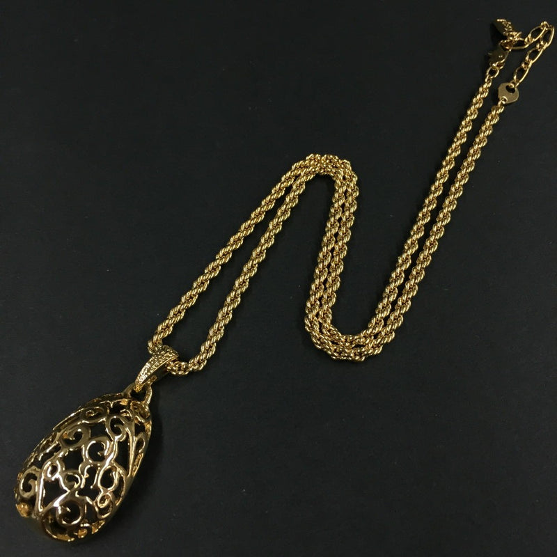 Yves Saint Laurent Gold Tone Pendant