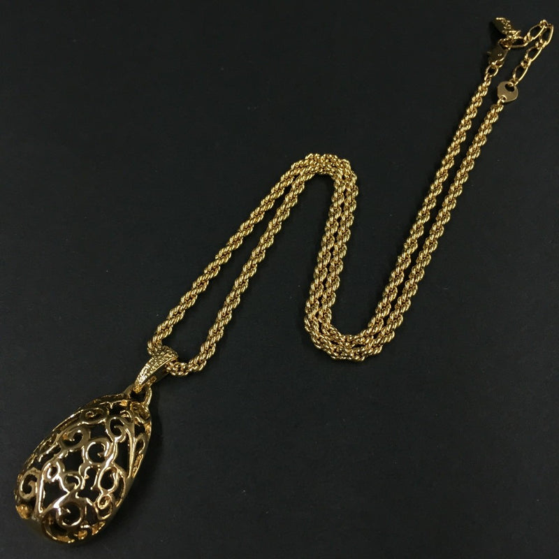 Yves Saint Laurent Gold Tone Pendant