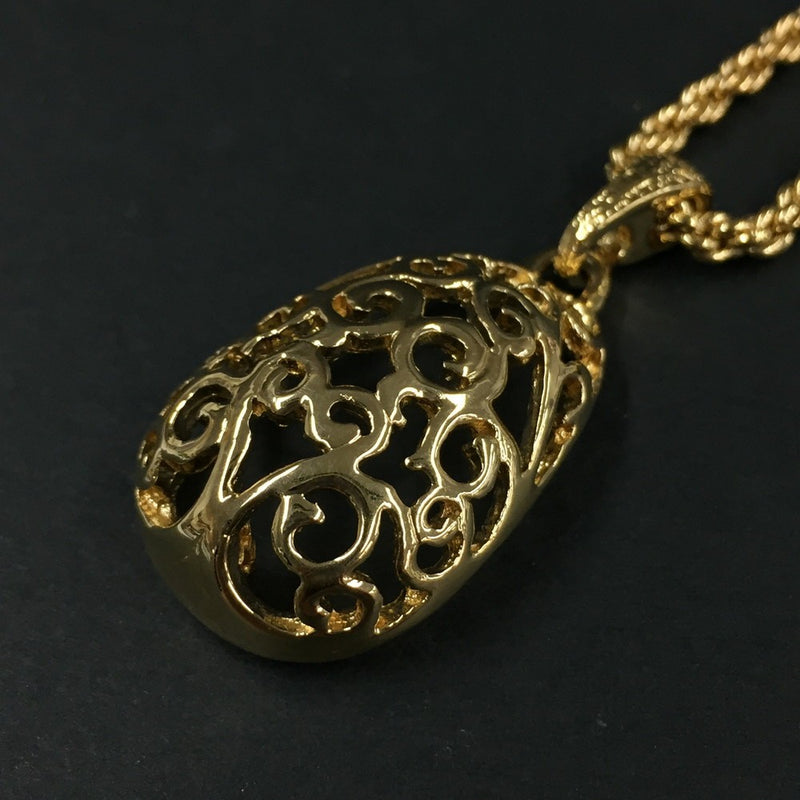 Yves Saint Laurent Gold Tone Pendant