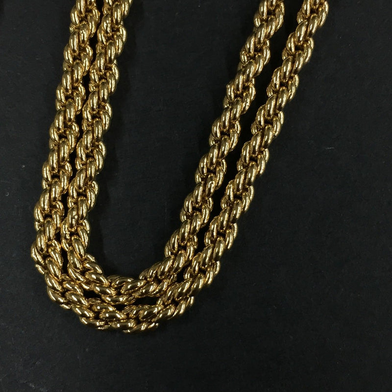 Yves Saint Laurent Gold Tone Pendant