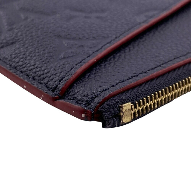 Pochette Melanie Empreinte Leather Mm