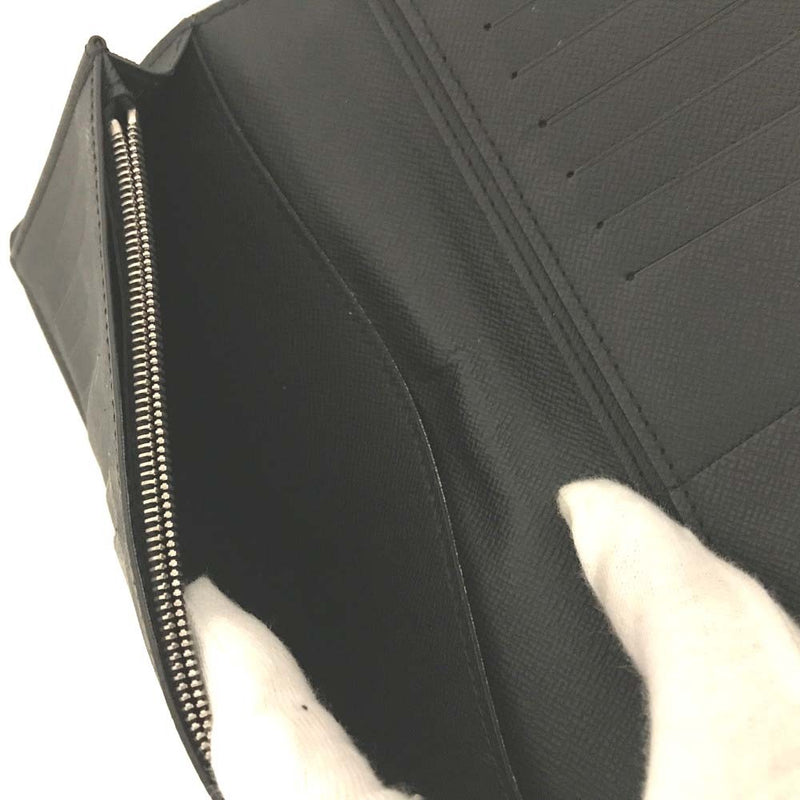 Louis Vuitton Taiga Porte Feiulle Brazza