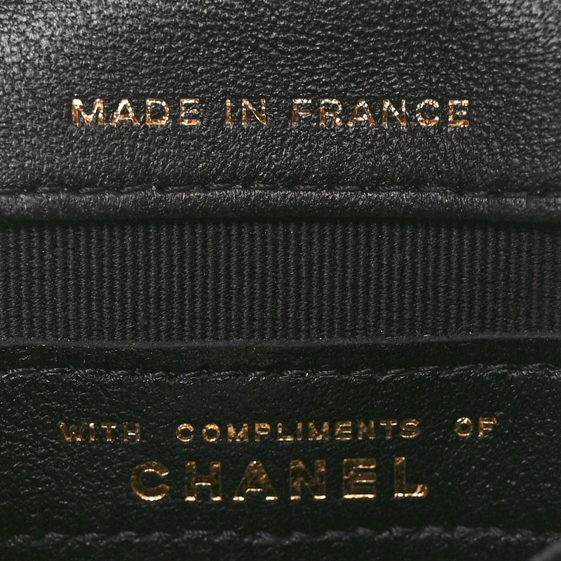 Lambskin Quilted Pearl Top Handle Clutch