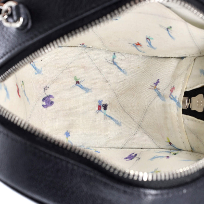 Cc Ski Round Clutch With Chain Goatskin