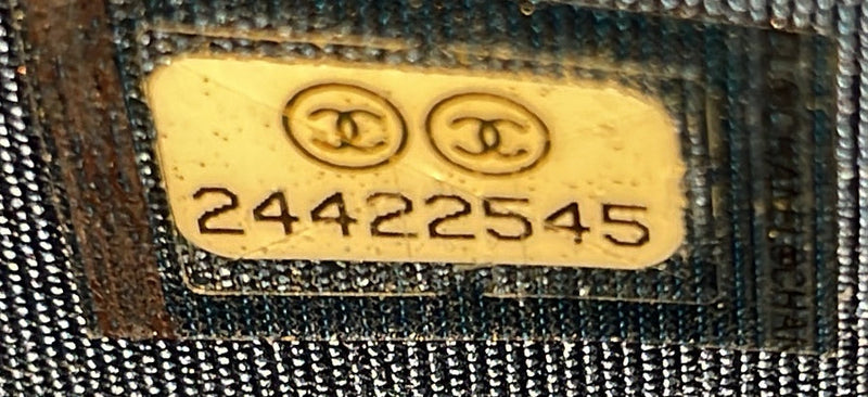 Chain Around Boy Wallet On Quilted