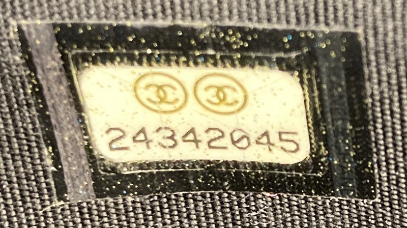 Chain Around Boy Wallet On Quilted