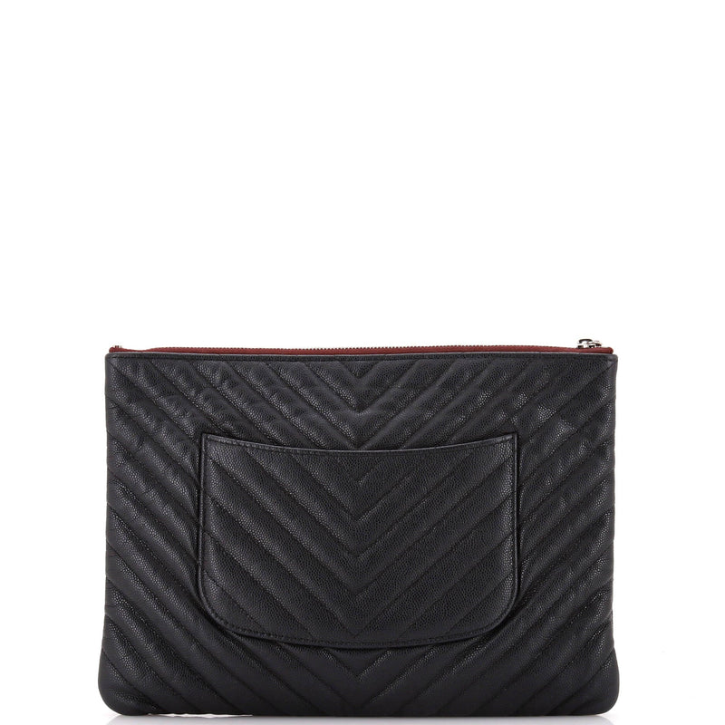 O Case Clutch Chevron Caviar Medium