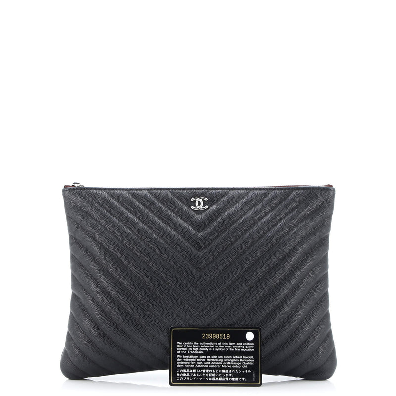 O Case Clutch Chevron Caviar Medium